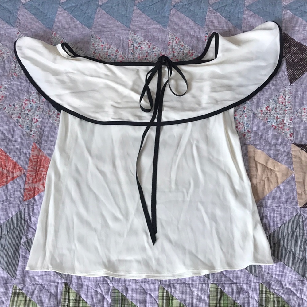 Alexis cream top with black trim